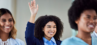 Staff member raising her hand